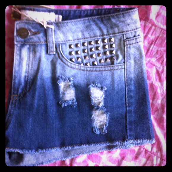 Distressed Jean shorts w/ studs