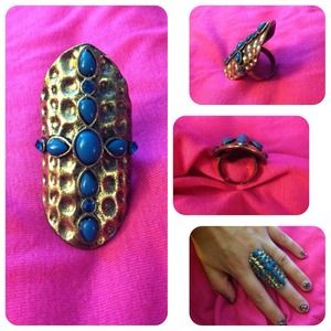 Dark gold ring with teal stones