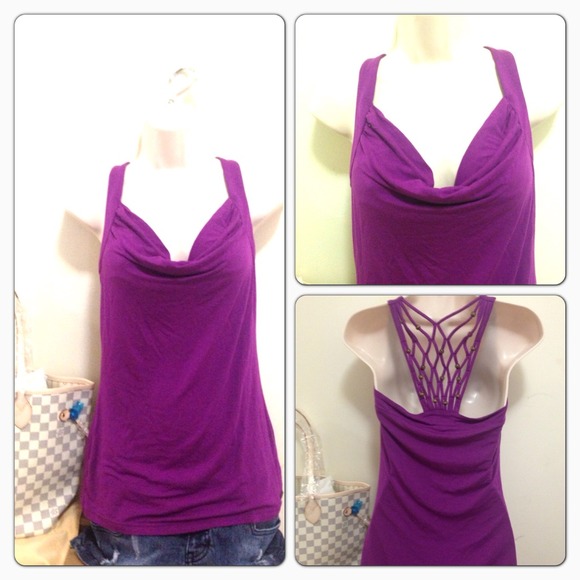 ✂️PRICECUT✂️Cute purple top with sexy back NWOT