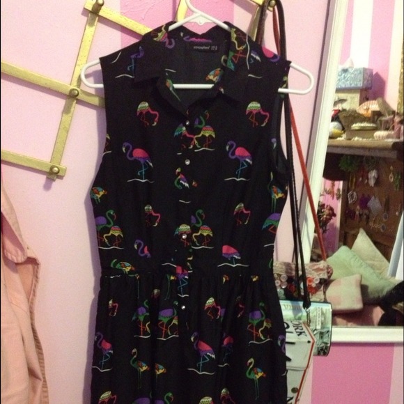 Black dress with flamingos.