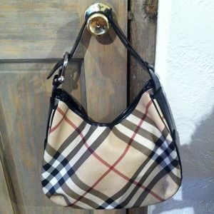 Burberry Handbag and matching wallet.
