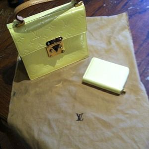 Louis Vuitton evening bag and wallet.