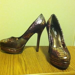 New; snake skin design high heels ; love them
