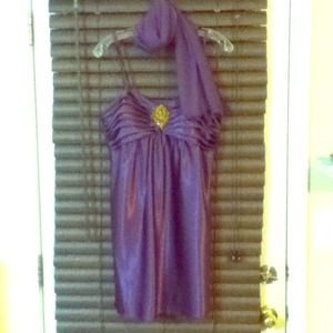 Plum colored evening dress.