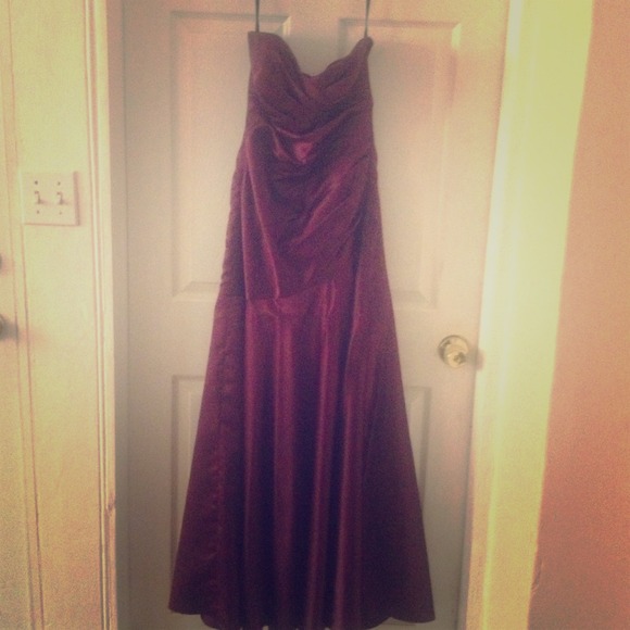 Floor length dress. Plum color