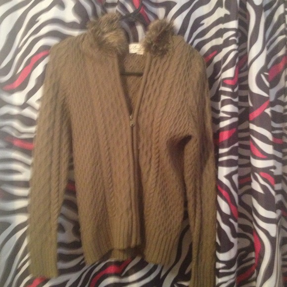 Knitted hoodie with faux fur hood.