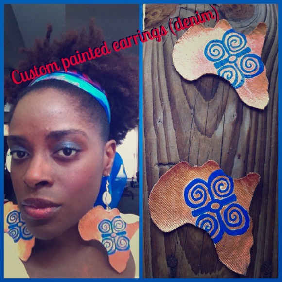Hand painted denim earrings in the shape of Africa