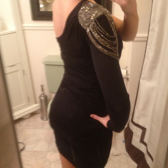 Black dress with embellishment on shoulder