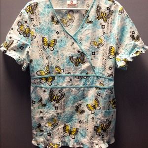 White cross scrub top size large