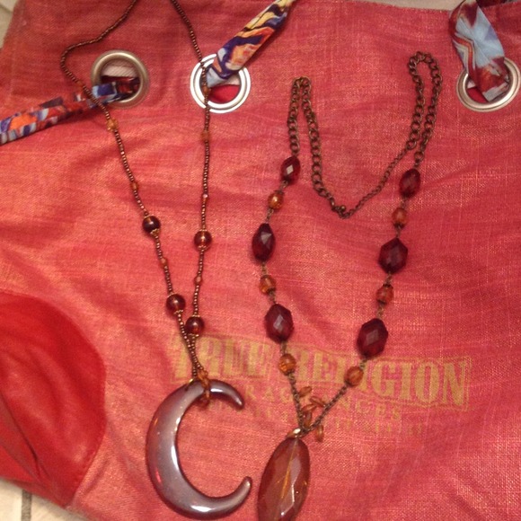 2 brown necklaces. With earings and cute bracelet