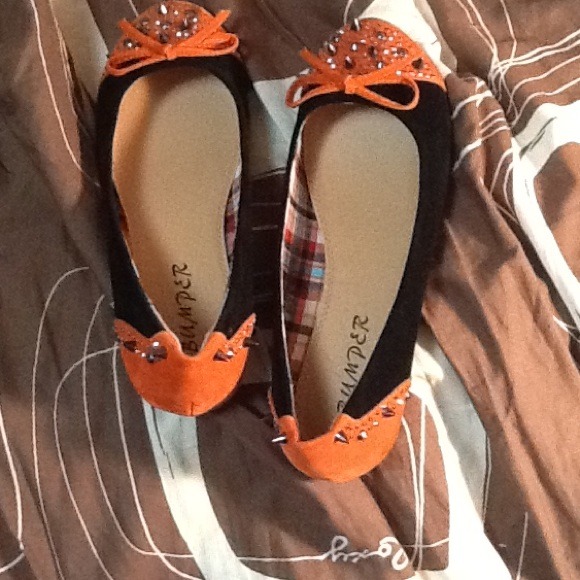 Black and orange with spikes flats