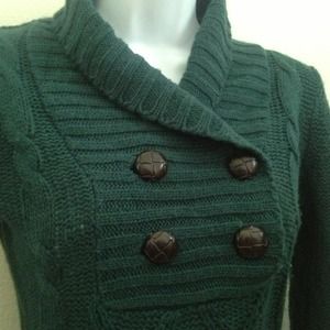 Dark green sweater.