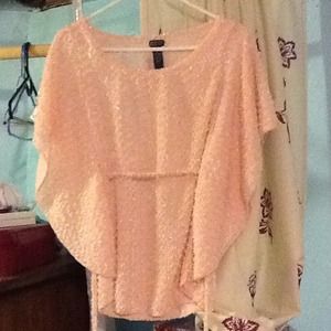 Peach color top.