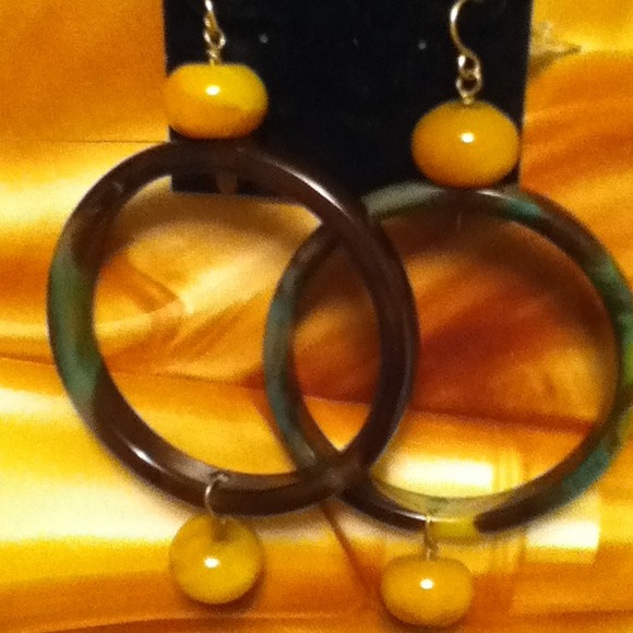 Earrings and navy formal dress trade