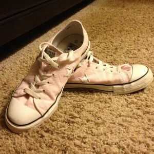 Pink low top Converse shoes