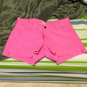 hot pink shorts.