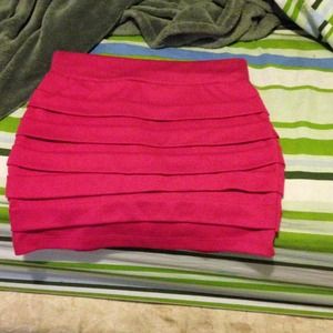 Very short pink pencil skirt.