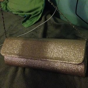 Gold glittery purse.