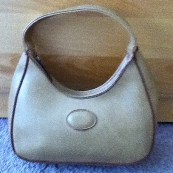 A small light brownish bag - Picture 1 of 4