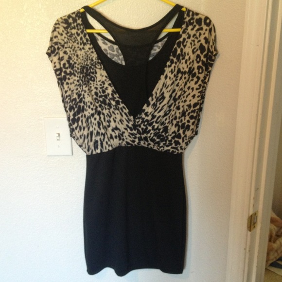 A fitted/lose back less dress