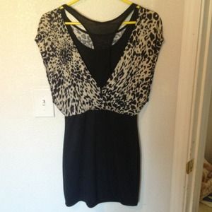 A fitted/lose back less dress