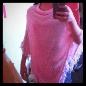 Pink knitted shawl.