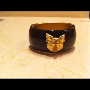 Black cuff with gold fox head