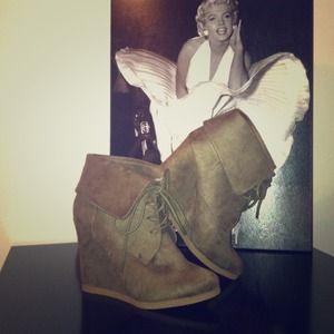 Adorable army green booties with a wedge.