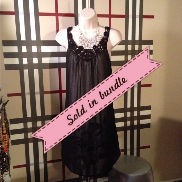 Unique dress with sheer overlay