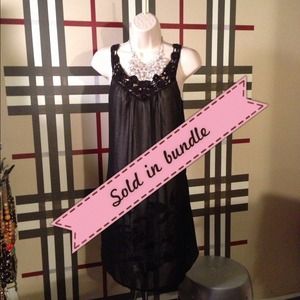 Unique dress with sheer overlay