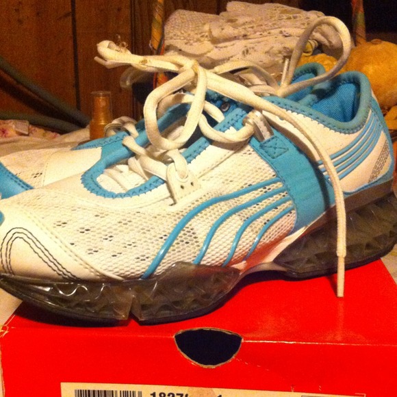 Brand new, never worn. Puma trainers w/air soles.