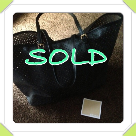 Sold Sold Sold!!!Michael Kors Perforated handbag
