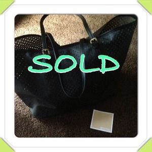 Sold Sold Sold!!!Michael Kors Perforated handbag