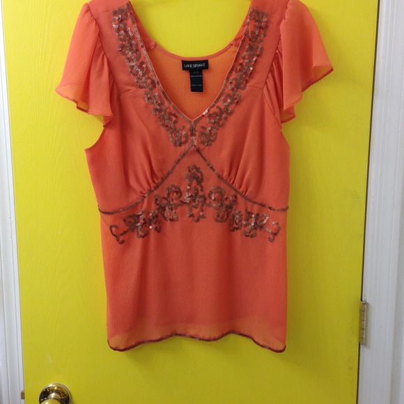 💋Light weight orange top with brown disks sewn on