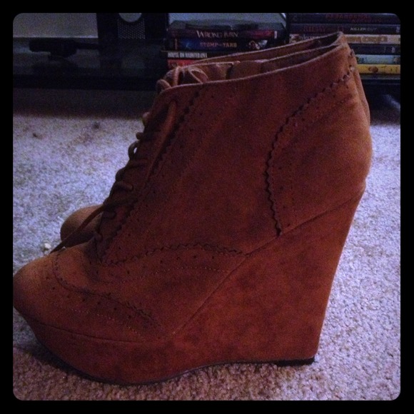Laced wedge ankle bootie