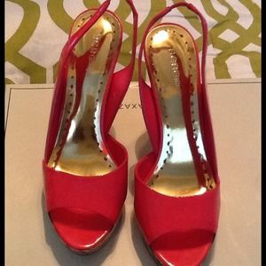 REDUCED BCBG patent leather sling back heels.
