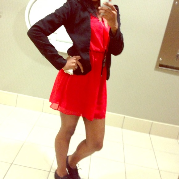 Red dress with gold button on sleeve