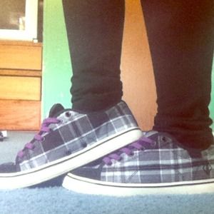 Purple , Black , And White Vans .