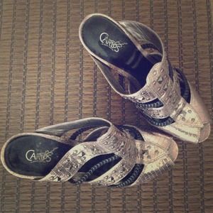Carlos Santana metallic peep toe mules