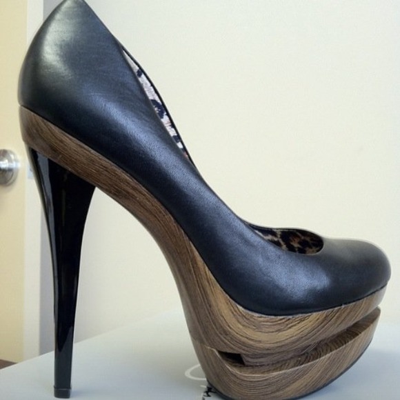 Never worn! Stiletto wooden platform