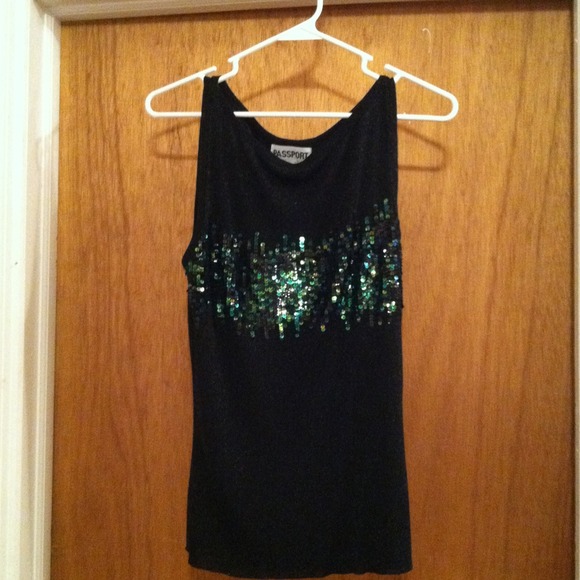 Sparkly tank with some stretch. Worn once
