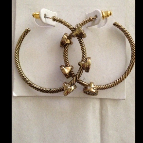 Free with purchase of $65 or more ...Bronze hoops