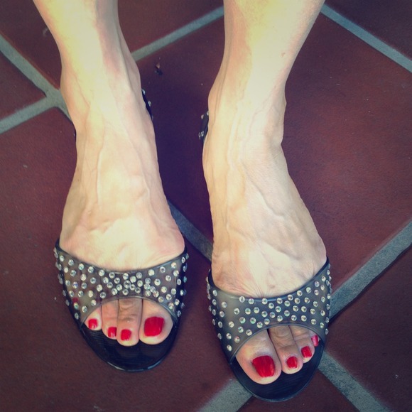 Used black see through rhinestone encrusted shoes.