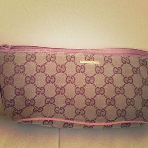Brown and pink Gucci pouchette