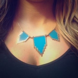 Bright blue and gold tribal inspired necklace.