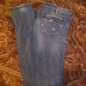 Silver distressed skinny jeans