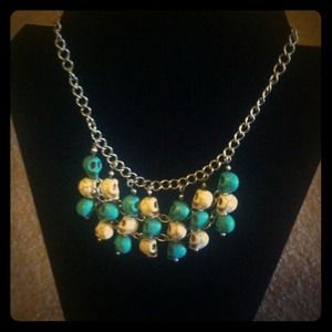 Blue and white skull necklace