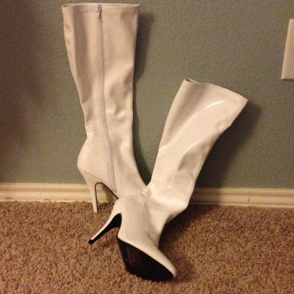 White patent leather knee high boots!