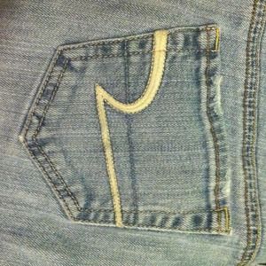 Three American eagle jeans .