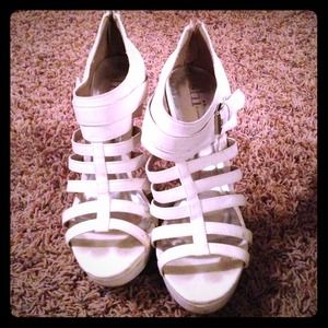 Pair of Shi shoes size 10